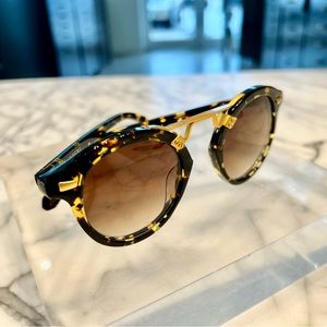 Krewe sunglasses.  NWT.  Zulu 24k gold plated hardware.  Amber gradient lens.